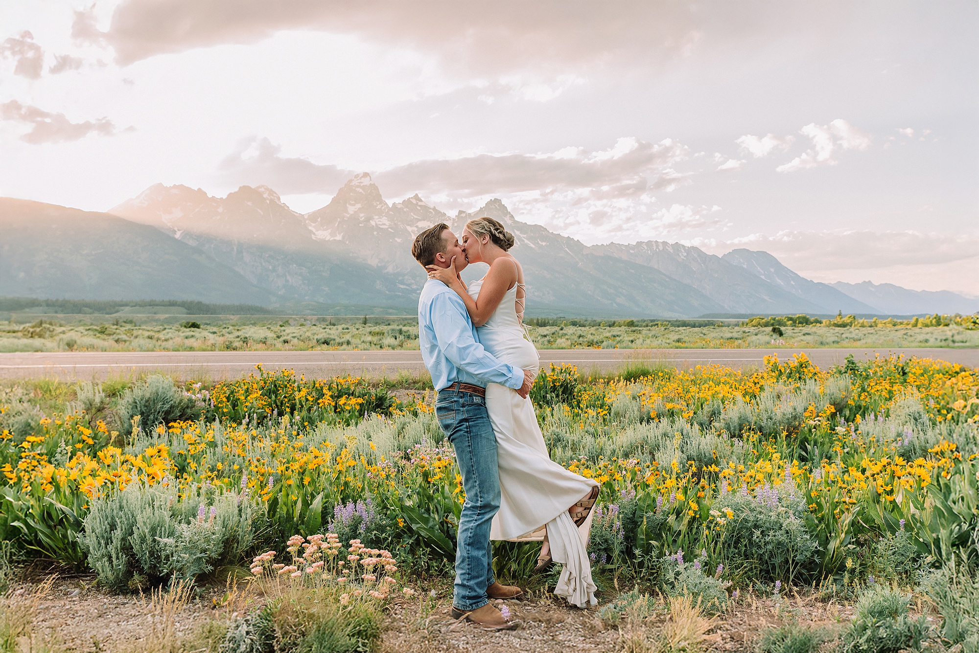 Blacktail Butte wildflower elopement session Grand Teton National Park intimate wedding photography Wyoming mountain elopement with children Summer Grand Teton elopement pictures June Wedding with wildflowers