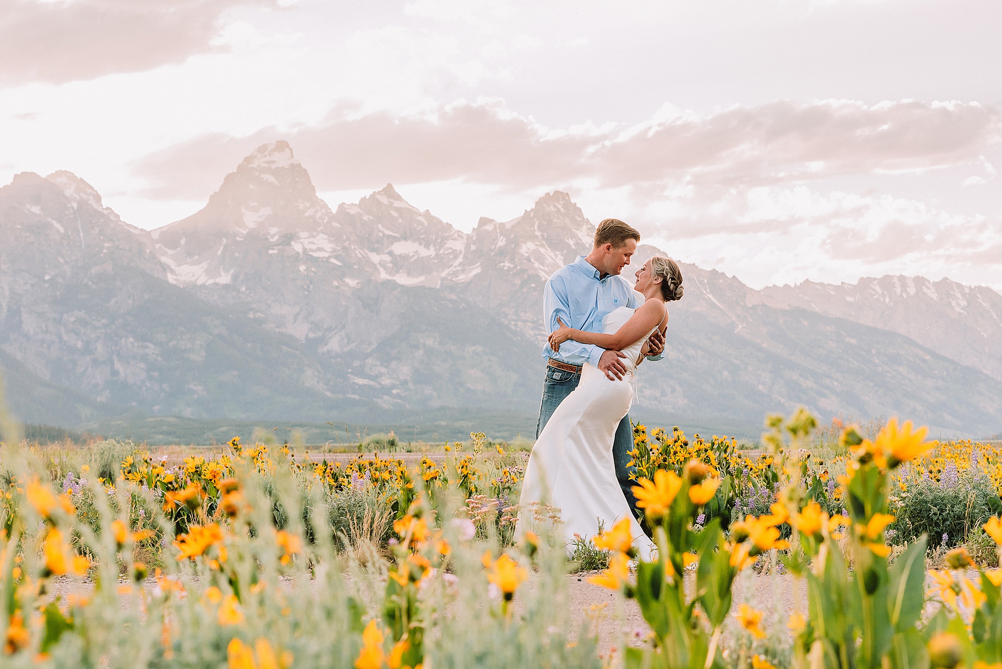 Blacktail Butte wildflower elopement session Grand Teton National Park intimate wedding photography Wyoming mountain elopement with children Summer Grand Teton elopement pictures June Wedding with wildflowers