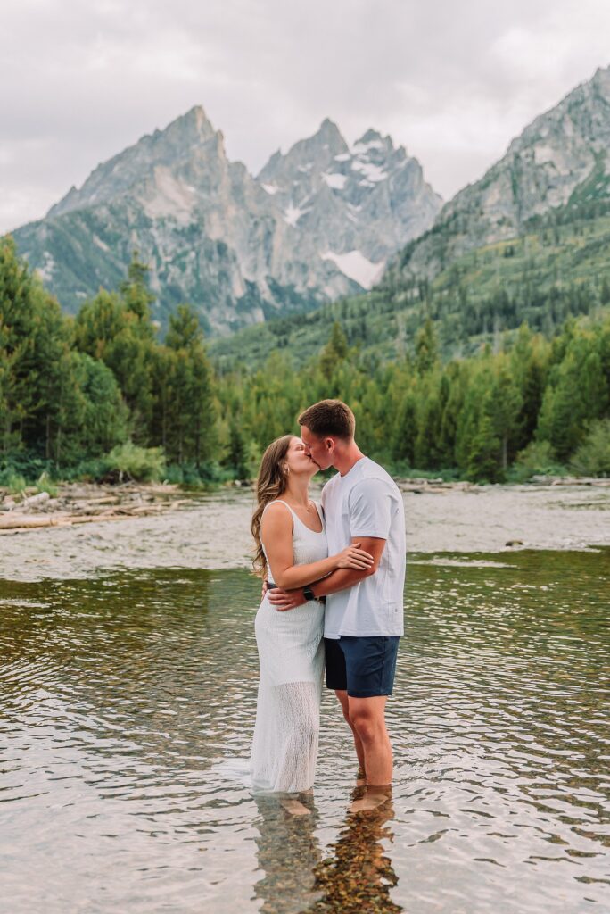 Jackson Hole Photographer Tetons engagement photos at String Lake Grand Teton National Park engagement session String Lake engagement photography Wyoming mountain engagement photos wooden bridge