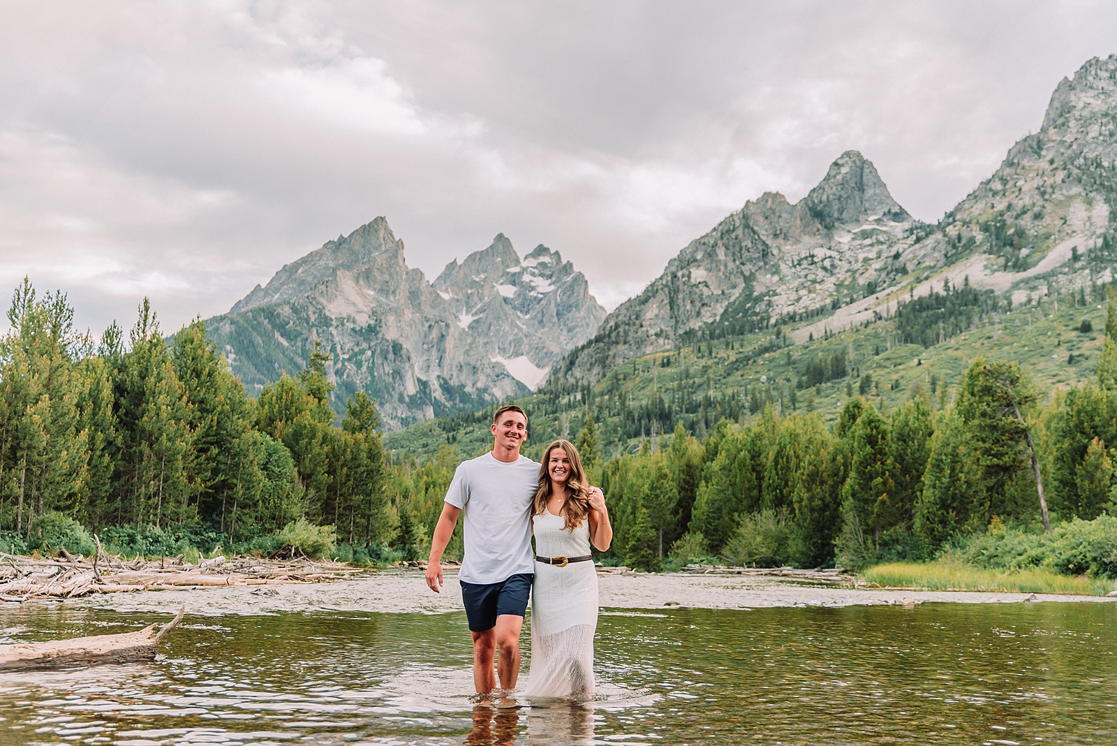Jackson Hole Photographer Tetons engagement photos at String Lake Grand Teton National Park engagement session String Lake engagement photography Wyoming mountain engagement photos wooden bridge