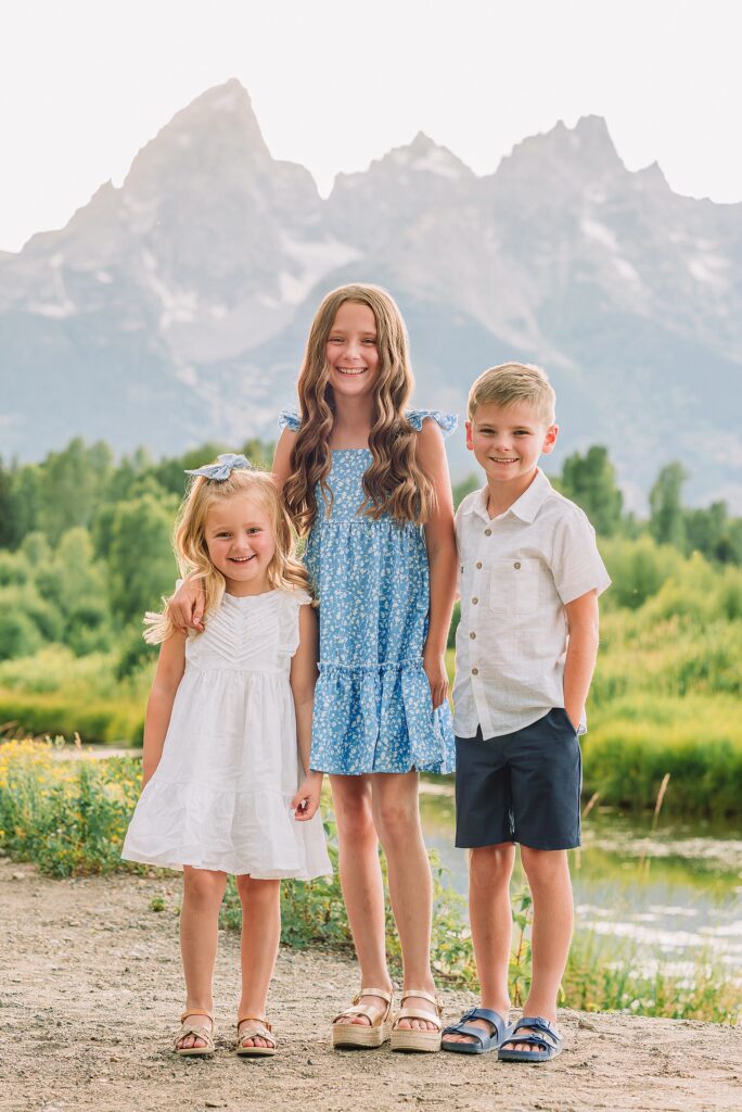 Schwabacher Landing family photos summer Grand Teton National Park family photographer what to wear for mountain family photos blue and white family photo outfits summer family session Jackson Hole