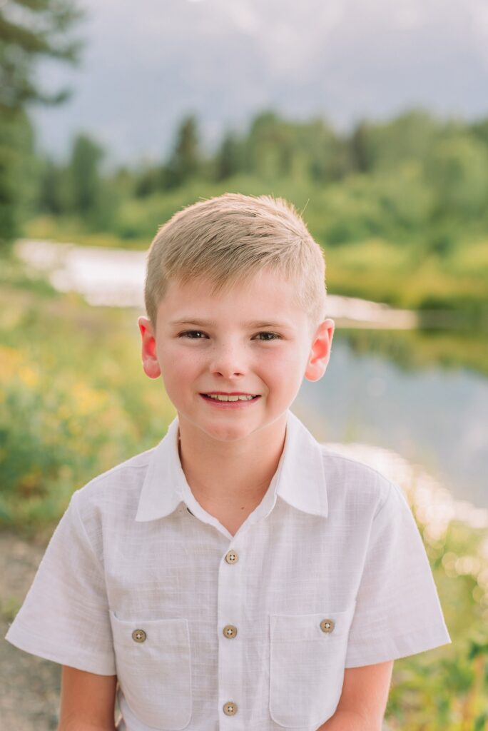 summer family session Jackson Hole Teton mountain backdrop family portraits coordinating family outfits without matching Grand Teton vacation photographer