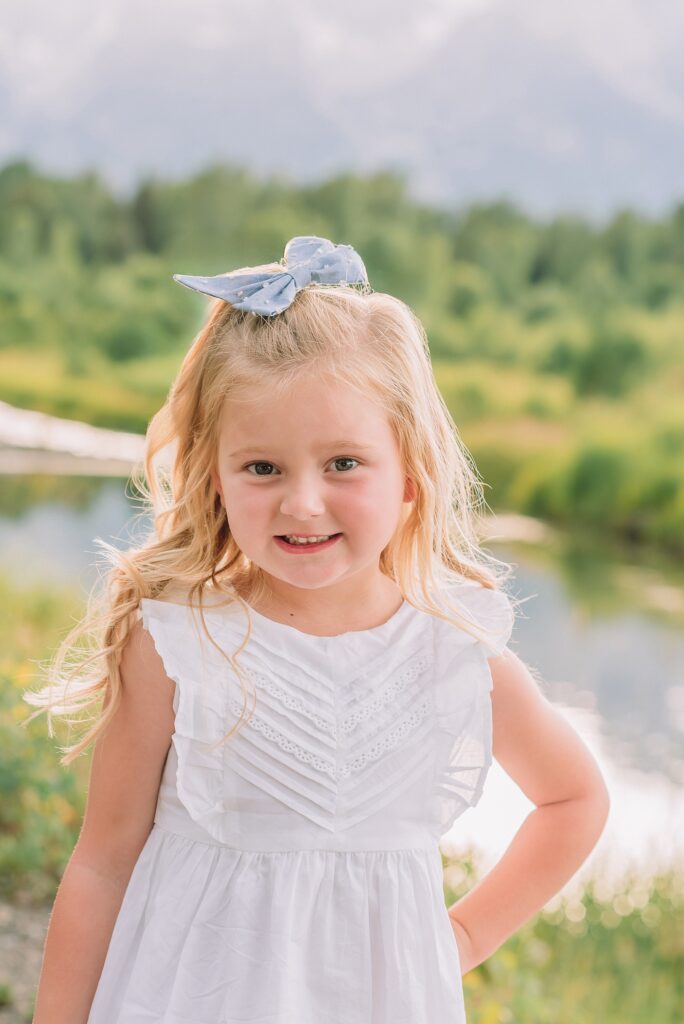 summer family session Jackson Hole Teton mountain backdrop family portraits coordinating family outfits without matching Grand Teton vacation photographer