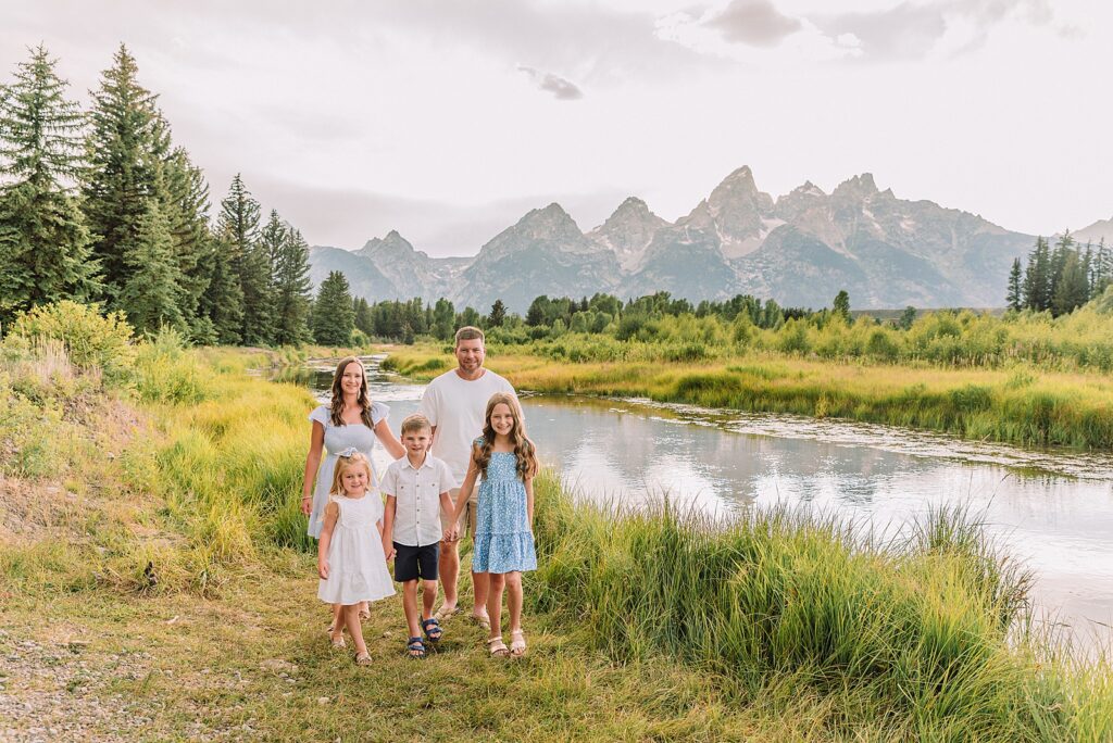 summer family session Jackson Hole Teton mountain backdrop family portraits coordinating family outfits without matching Grand Teton vacation photographer