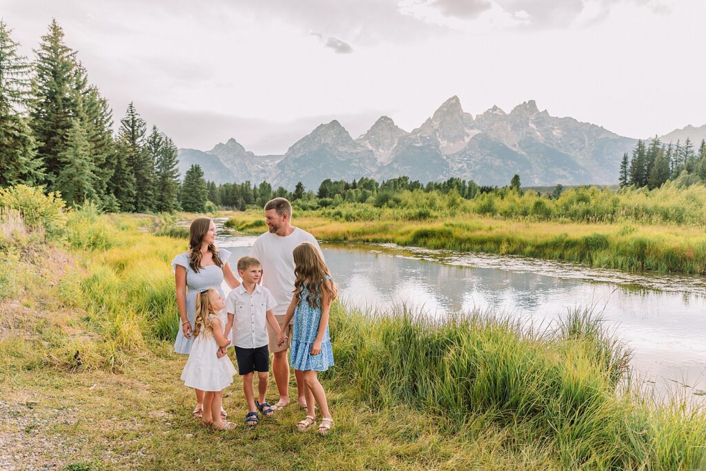 summer family session Jackson Hole Teton mountain backdrop family portraits coordinating family outfits without matching Grand Teton vacation photographer