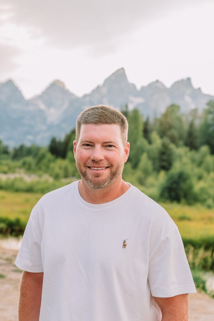 summer family session Jackson Hole Teton mountain backdrop family portraits coordinating family outfits without matching Grand Teton vacation photographer