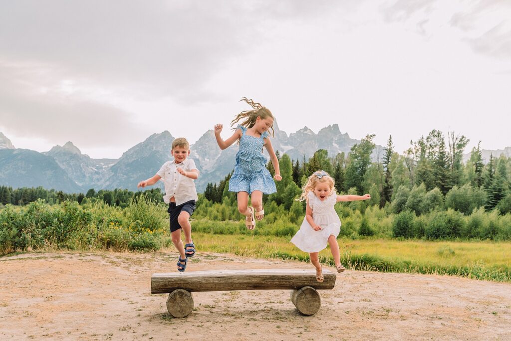 summer family session Jackson Hole Teton mountain backdrop family portraits coordinating family outfits without matching Grand Teton vacation photographer
