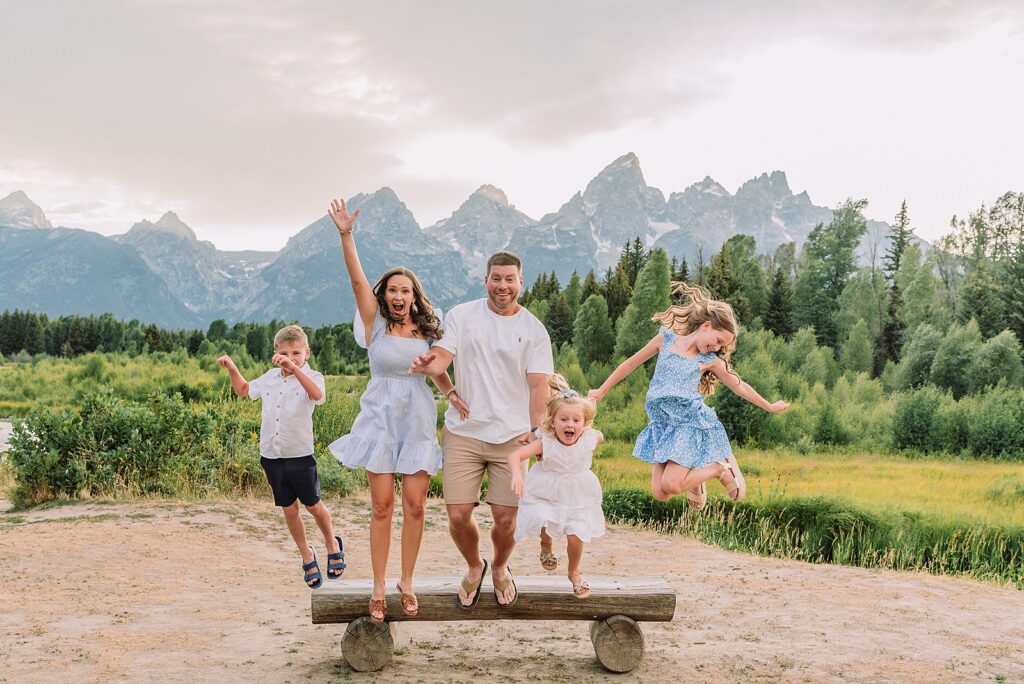 what to wear for mountain family photos blue and white family photo outfits summer family session Jackson Hole Teton mountain backdrop family portraits coordinating family outfits without matching