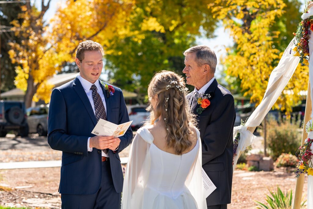backyard elopement to wedding celebration handmade wedding arch ceremony photography Utah Wedding Photographer small town Utah wedding celebration