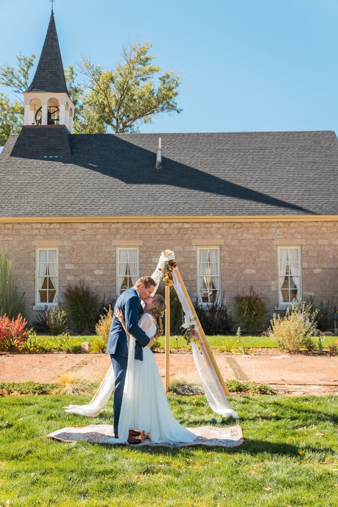 backyard elopement to wedding celebration handmade wedding arch ceremony photography Utah Wedding Photographer small town Utah wedding celebration