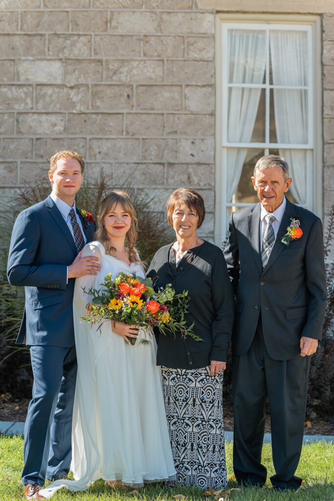 backyard elopement to wedding celebration handmade wedding arch ceremony photography Utah Wedding Photographer small town Utah wedding celebration