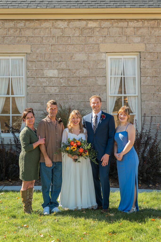 backyard elopement to wedding celebration handmade wedding arch ceremony photography Utah Wedding Photographer small town Utah wedding celebration