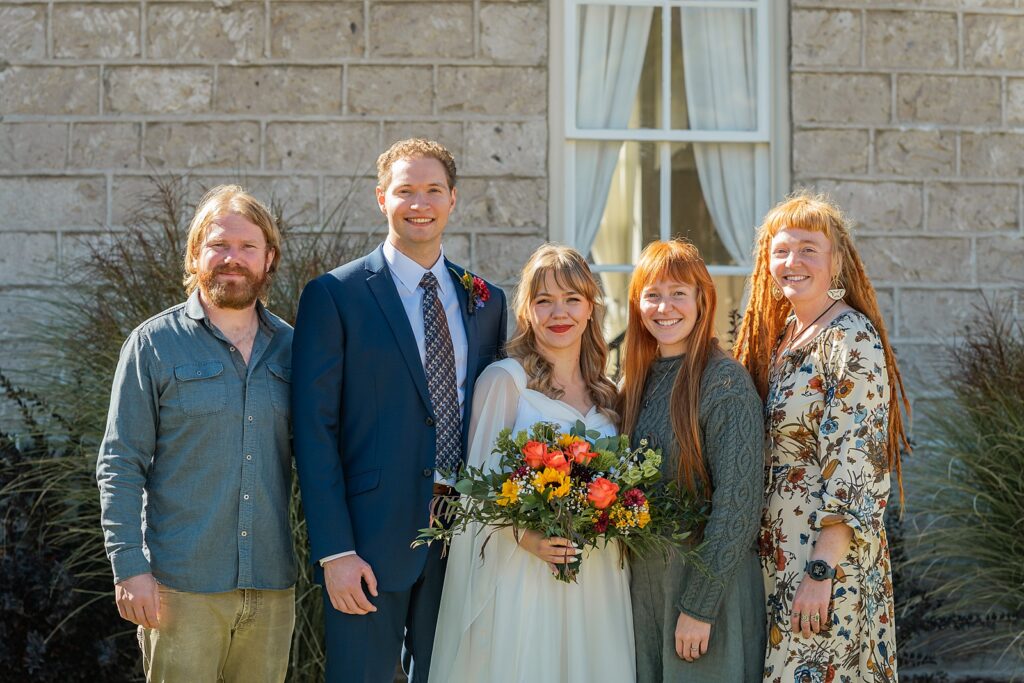 backyard elopement to wedding celebration handmade wedding arch ceremony photography Utah Wedding Photographer small town Utah wedding celebration