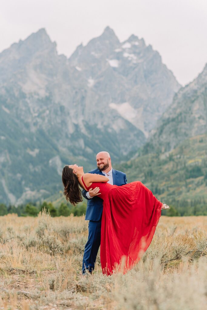 Cathedral View Turnout engagement photography Wyoming couples photographer Jackson Hole Cathedral View Turnout engagement photography dressy engagement session outfit ideas
