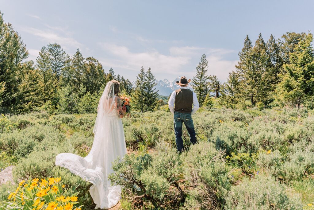 Wyoming wedding photographer Grand Teton National Park ceremony The Wedding Tree Bridger-Teton National Forest wedding photos Bride first look with dad Wyoming mountain wedding Yellow wildflower wedding photos Jackson Hole Wyoming Jackson Hole wedding photographer