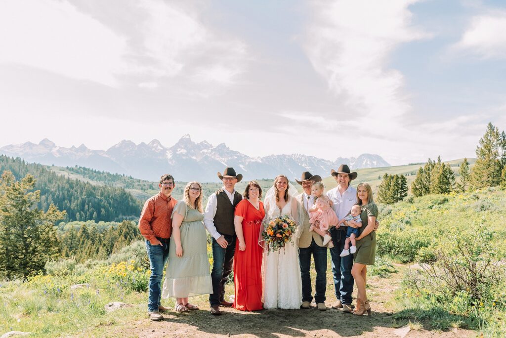 Wyoming wedding photographer Grand Teton National Park ceremony The Wedding Tree Bridger-Teton National Forest wedding photos Wyoming mountain wedding photographer Yellow wildflower wedding photos Jackson Hole Wyoming Jackson Hole wedding photographer