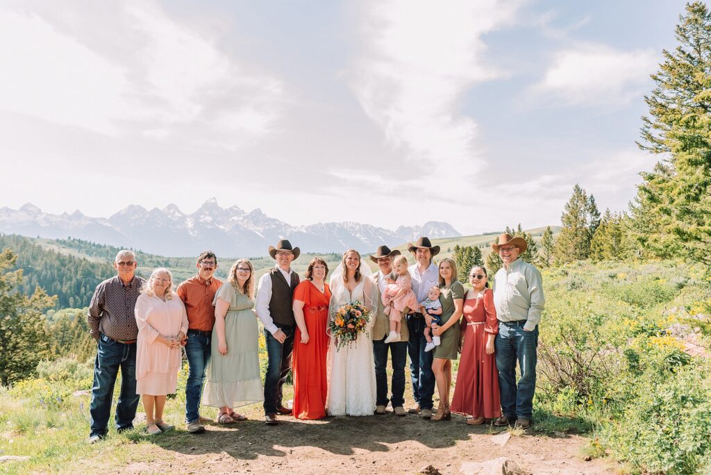 Wyoming wedding photographer Grand Teton National Park ceremony The Wedding Tree Bridger-Teton National Forest wedding photos Wyoming mountain wedding photographer Yellow wildflower wedding photos Jackson Hole Wyoming Jackson Hole wedding photographer
