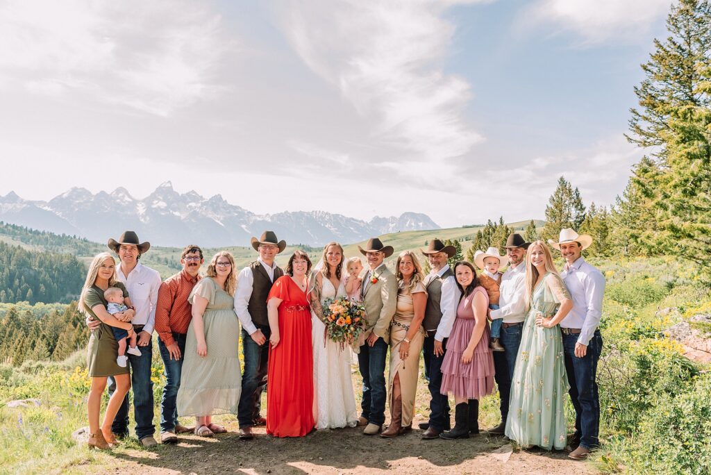 Wyoming wedding photographer Grand Teton National Park ceremony The Wedding Tree Bridger-Teton National Forest wedding photos Wyoming mountain wedding photographer Yellow wildflower wedding photos Jackson Hole Wyoming Jackson Hole wedding photographer