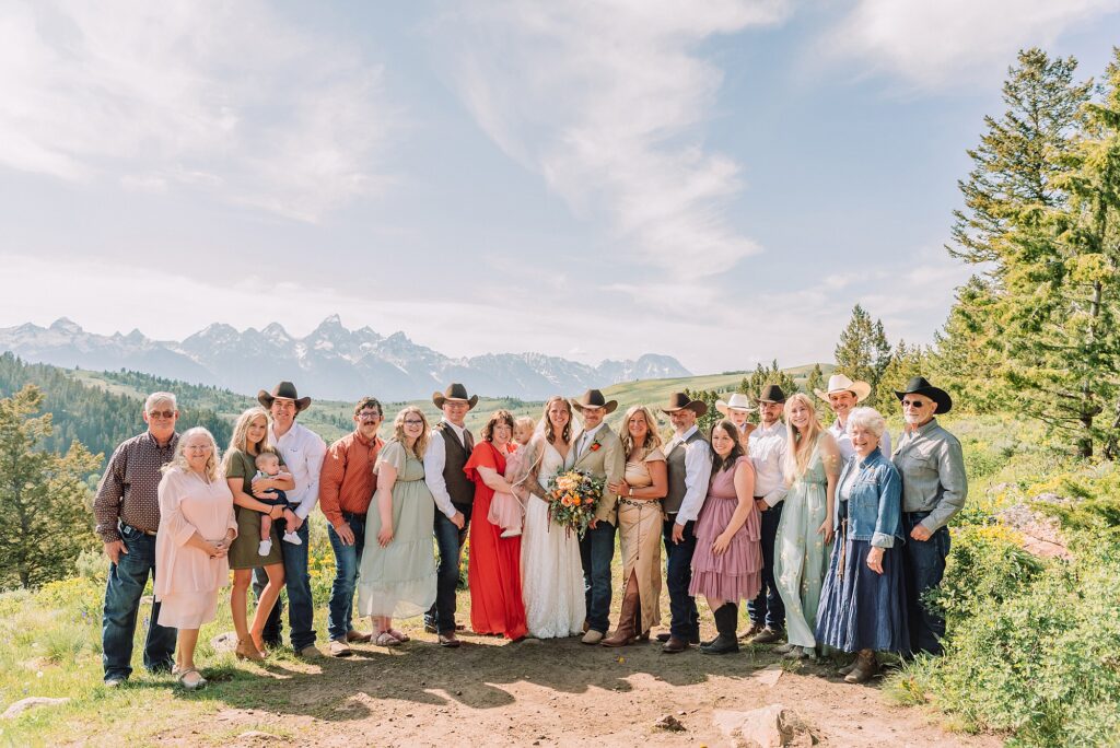 Wyoming wedding photographer Grand Teton National Park ceremony The Wedding Tree Bridger-Teton National Forest wedding photos Wyoming mountain wedding photographer Yellow wildflower wedding photos Jackson Hole Wyoming Jackson Hole wedding photographer