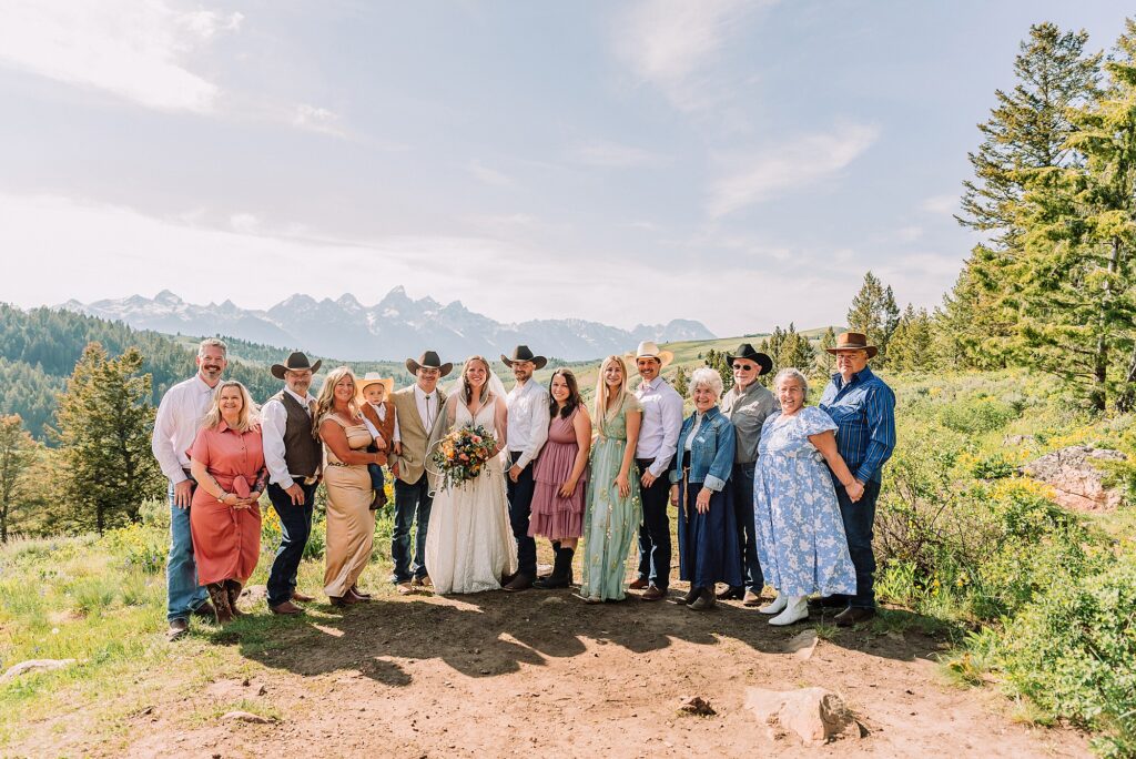 Wyoming wedding photographer Grand Teton National Park ceremony The Wedding Tree Bridger-Teton National Forest wedding photos Wyoming mountain wedding photographer Yellow wildflower wedding photos Jackson Hole Wyoming Jackson Hole wedding photographer