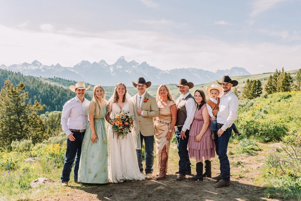 Wyoming wedding photographer Grand Teton National Park ceremony The Wedding Tree Bridger-Teton National Forest wedding photos Wyoming mountain wedding photographer Yellow wildflower wedding photos Jackson Hole Wyoming Jackson Hole wedding photographer