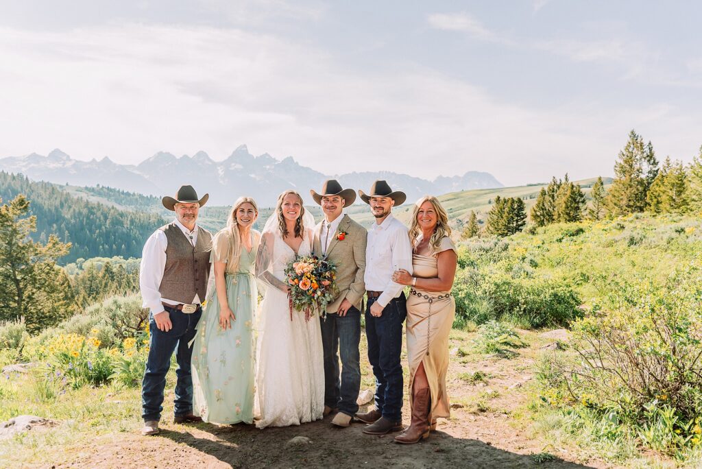 Wyoming wedding photographer Grand Teton National Park ceremony The Wedding Tree Bridger-Teton National Forest wedding photos Wyoming mountain wedding photographer Yellow wildflower wedding photos Jackson Hole Wyoming Jackson Hole wedding photographer