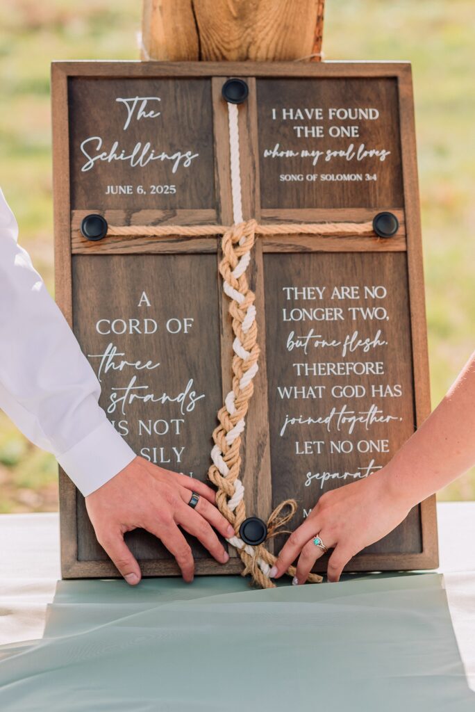 Rustic Wyoming outdoor wedding reception dance floor Faith-based knot tying wedding ceremony Wyoming Candid hilarious cake cutting wedding photos Two-day Wyoming wedding ceremony and reception photography destination Wyoming wedding photography