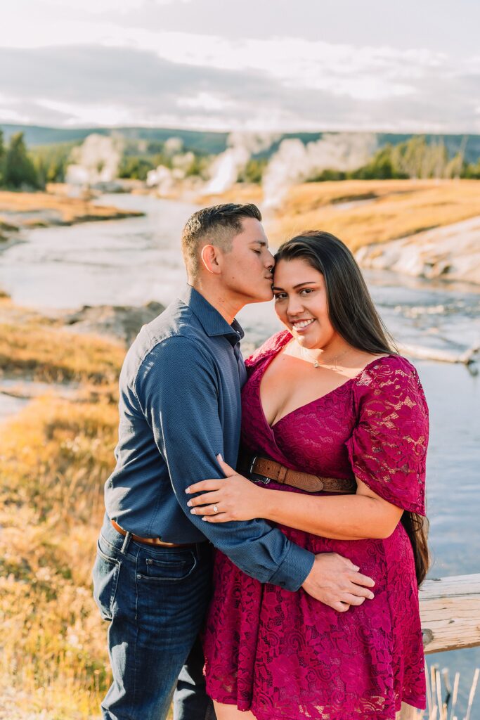 Yellowstone engagement photos at Castle Geyser Upper Geyser Basin engagement photography Firehole River bridge engagement photos Old Faithful elopement photographer Yellowstone hot springs engagement session Yellowstone Engagement Photographer