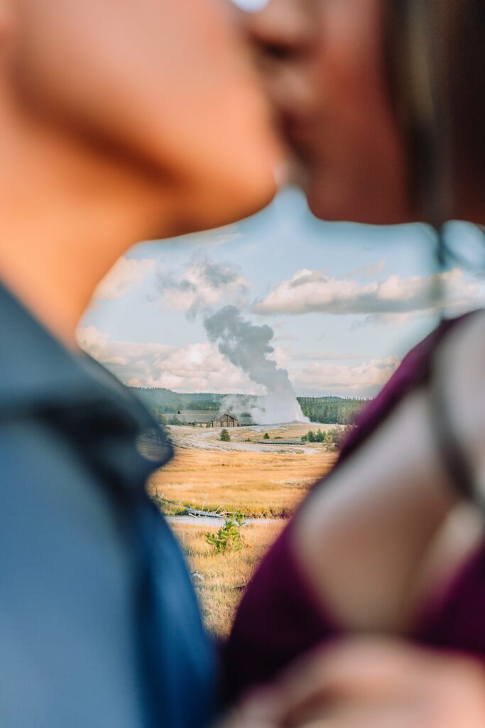 Yellowstone engagement photos at Castle Geyser Upper Geyser Basin engagement photography Firehole River bridge engagement photos Old Faithful elopement photographer Yellowstone hot springs engagement session Yellowstone Engagement Photographer