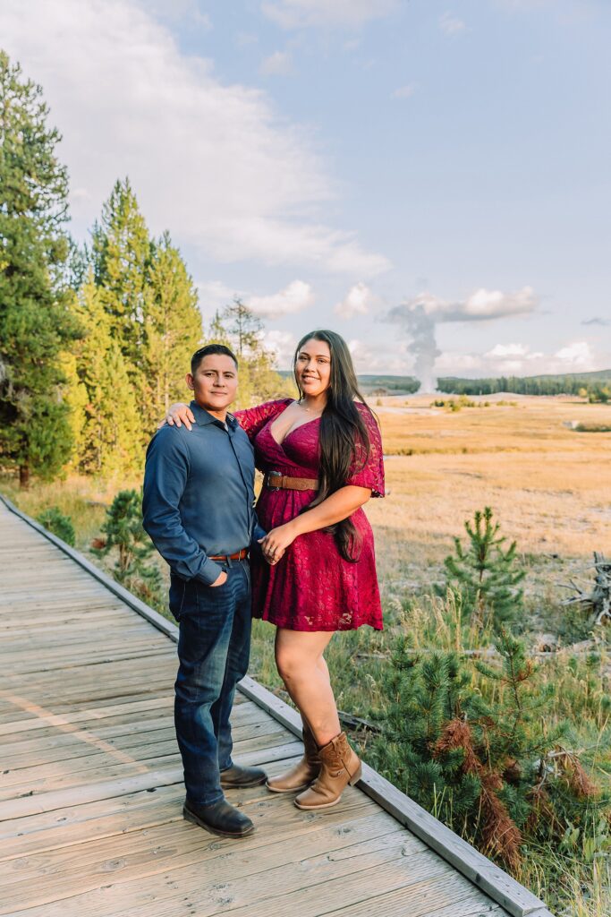 Yellowstone engagement photos at Castle Geyser Upper Geyser Basin engagement photography Firehole River bridge engagement photos Old Faithful elopement photographer Yellowstone hot springs engagement session Yellowstone Engagement Photographer