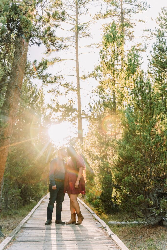 Yellowstone engagement photos at Castle Geyser Old Faithful Inn engagement session Upper Geyser Basin engagement photography Yellowstone hot springs engagement session Yellowstone Engagement Photographer