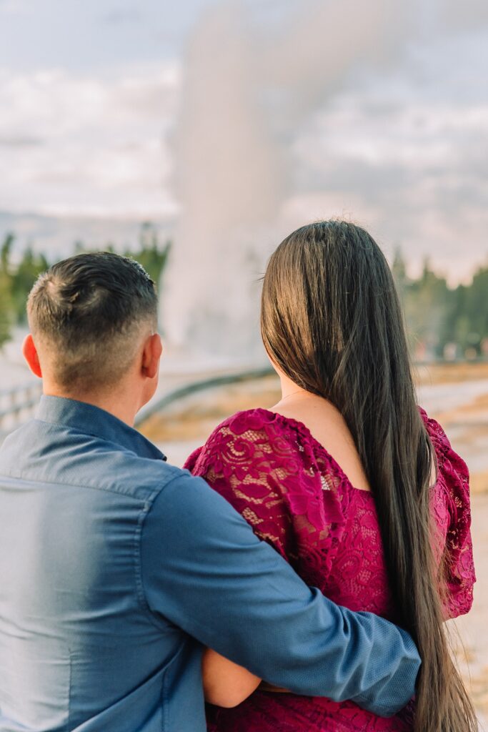 Yellowstone engagement photos at Castle Geyser Old Faithful Inn engagement session Upper Geyser Basin engagement photography Yellowstone hot springs engagement session Yellowstone Engagement Photographer