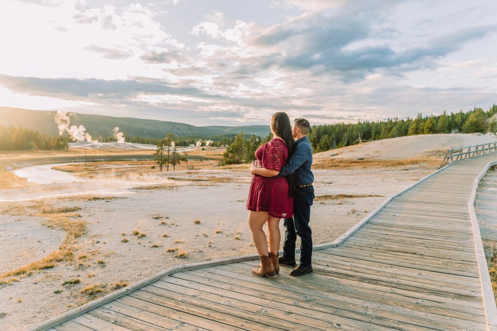 Yellowstone engagement photos at Castle Geyser Old Faithful Inn engagement session Upper Geyser Basin engagement photography Yellowstone hot springs engagement session Yellowstone Engagement Photographer