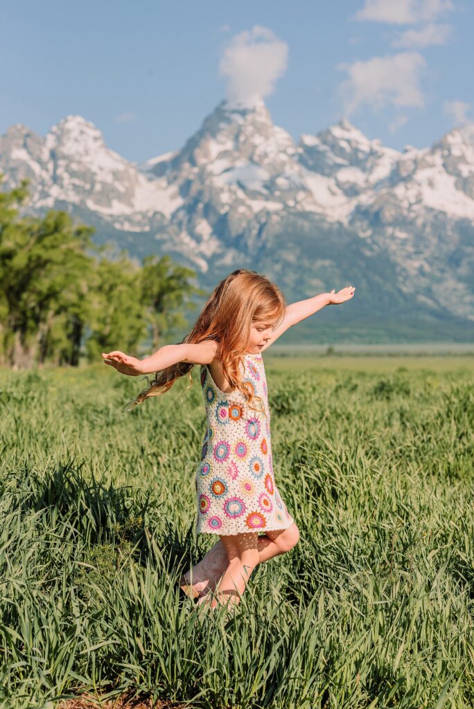 Grand Teton family photographer Mormon Row family photos at Mormon Row Wyoming Grand Tetons family photography June Mormon Row lupine family session Jackson Hole family photographer summer