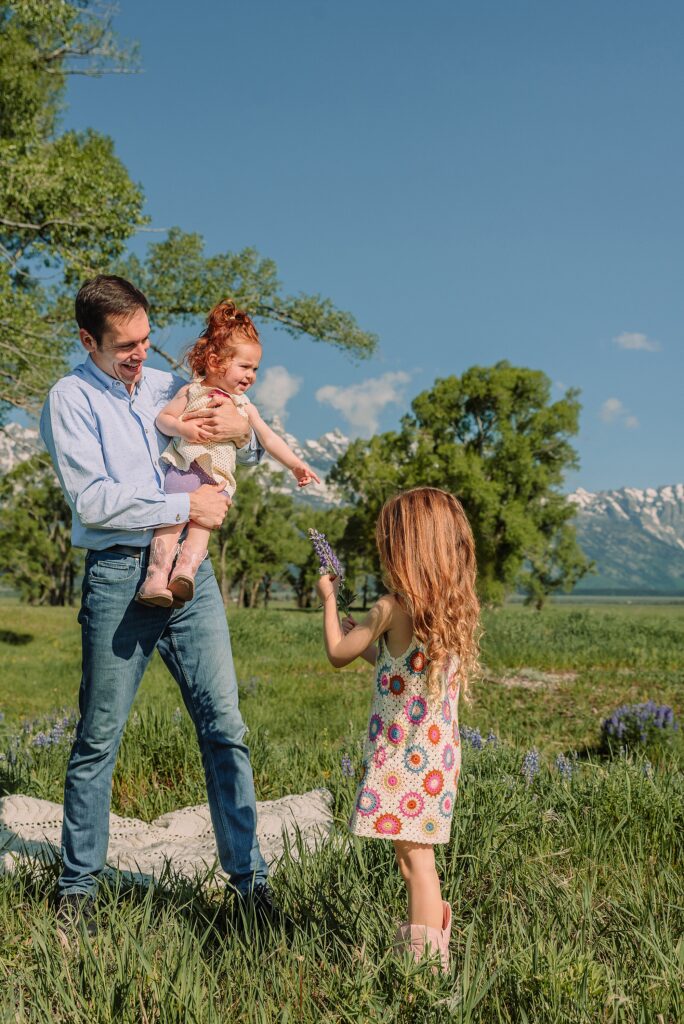 Grand Tetons family photography June Mormon Row lupine family session Jackson Hole family photographer summer Grand Tetons family photos with kids western family photoshoot Grand Tetons