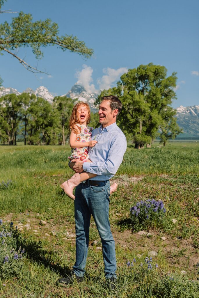 Grand Teton family photographer Mormon Row Mormon Row lupine family session Jackson Hole family photographer summer best time for family photos Grand Tetons Grand Tetons mountain backdrop family photos